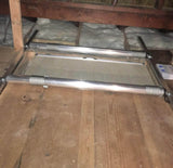 Detailed view of the platform's metal frame and cable system, showing its sturdy construction for heavy-duty use