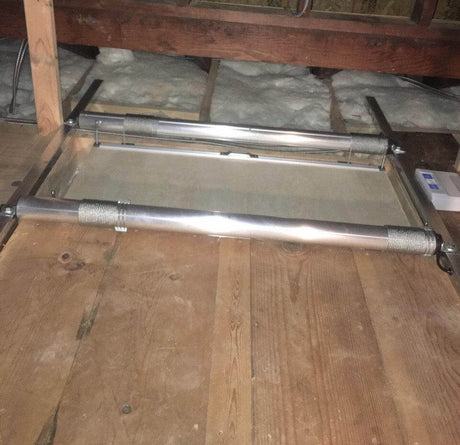 Detailed view of the platform's metal frame and cable system, showing its sturdy construction for heavy-duty use