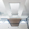Wide-angle shot of the Auxx Attic Lift installed in a spacious garage, ready to transport items to an attic storage area
