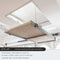 View of the platform fully raised, showing the clear space available for storing bulky items in the attic