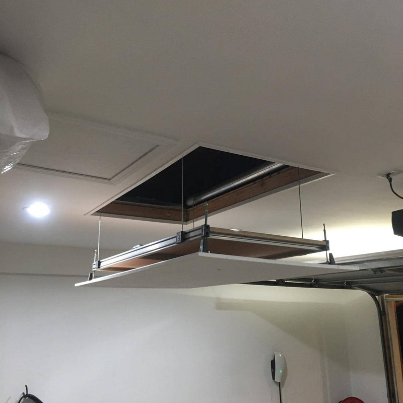 Side view of the Auxx Attic Lift in operation, showing the platform raising items into the attic space