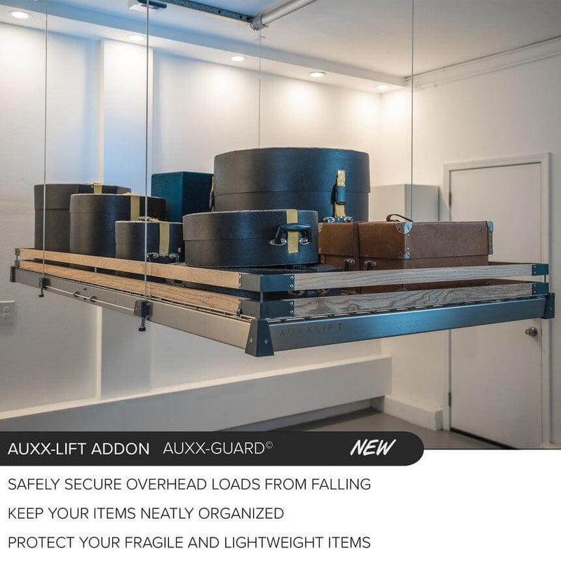 Wide shot showing the Auxx Guard in a garage setting, illustrating its function as a safety barrier
