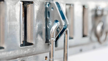 Close-up of the Auxx Lift Carabiner Snap-In Anchor, showing its secure, durable design for easy attachment to lifting systems