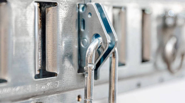 Close-up of the Auxx Lift Carabiner Snap-In Anchor, showing its secure, durable design for easy attachment to lifting systems