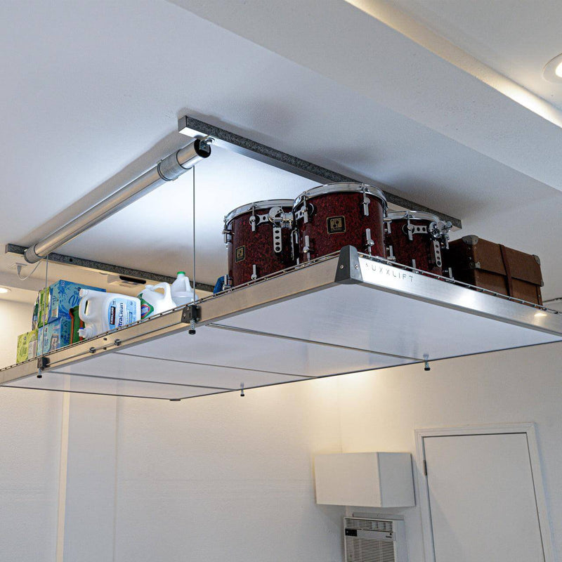 Side perspective of the Auxx Lift Cover showing its snug fit and edge detailing over the platform