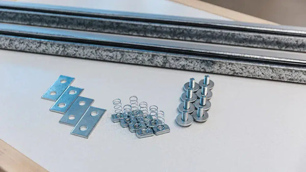 Close-up of the Auxx Lift Platform Rotation Hardware Kit, showing key components like brackets and support hardware