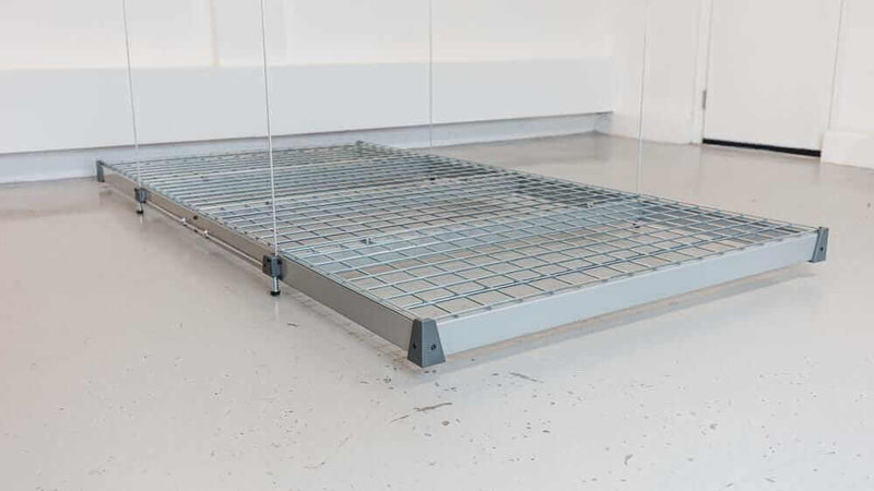 View of the Auxx Lift's wireless remote control, illustrating its user-friendly interface and programmable buttons