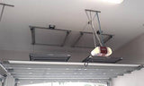 The Auxx Lift mid-operation, shown partially lowered with visible cable tension and platform alignment
