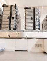 Garage scene with the Auxx Lift in lowered position, showcasing ease of access to stored items