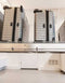 Garage scene with the Auxx Lift in lowered position, showcasing ease of access to stored items