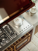 ILVE Nostalgie II 60-Inch Dual Fuel Range with 7 Burners, Griddle, & French Top with Triple Glass Door Oven in Antique White with Bronze Trim (UP60FSNMPAWB)